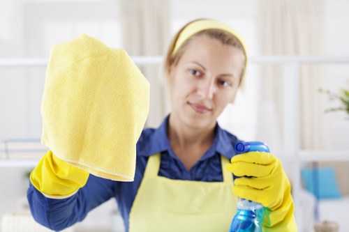 Local cleaner preparing a guest-ready flat in SW3