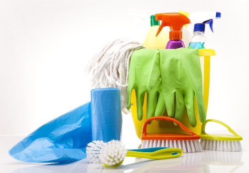 Professional sofa cleaning service for a SW3 living room sofa